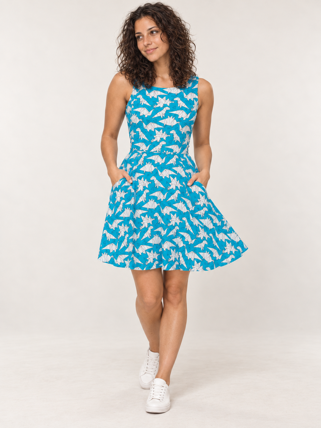 Model wearing the Origami Dinosaur Dress, full-body front view