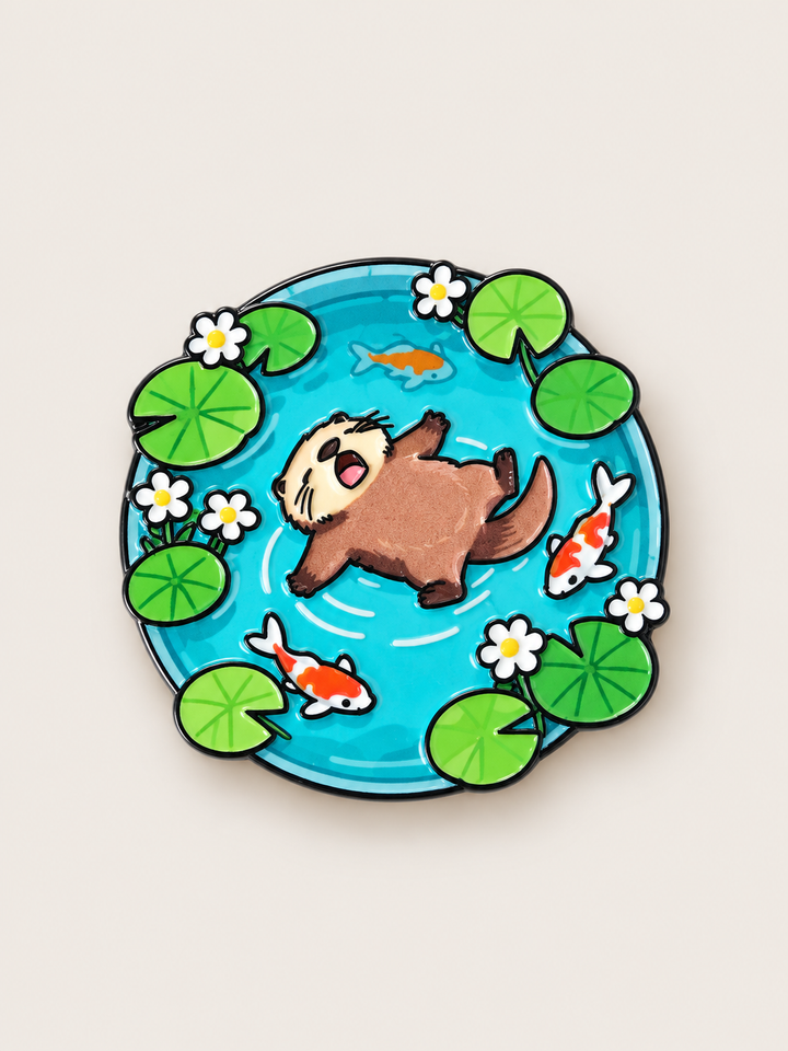 Otter Floating in Koi Pond Pin shown on a warm neutral background