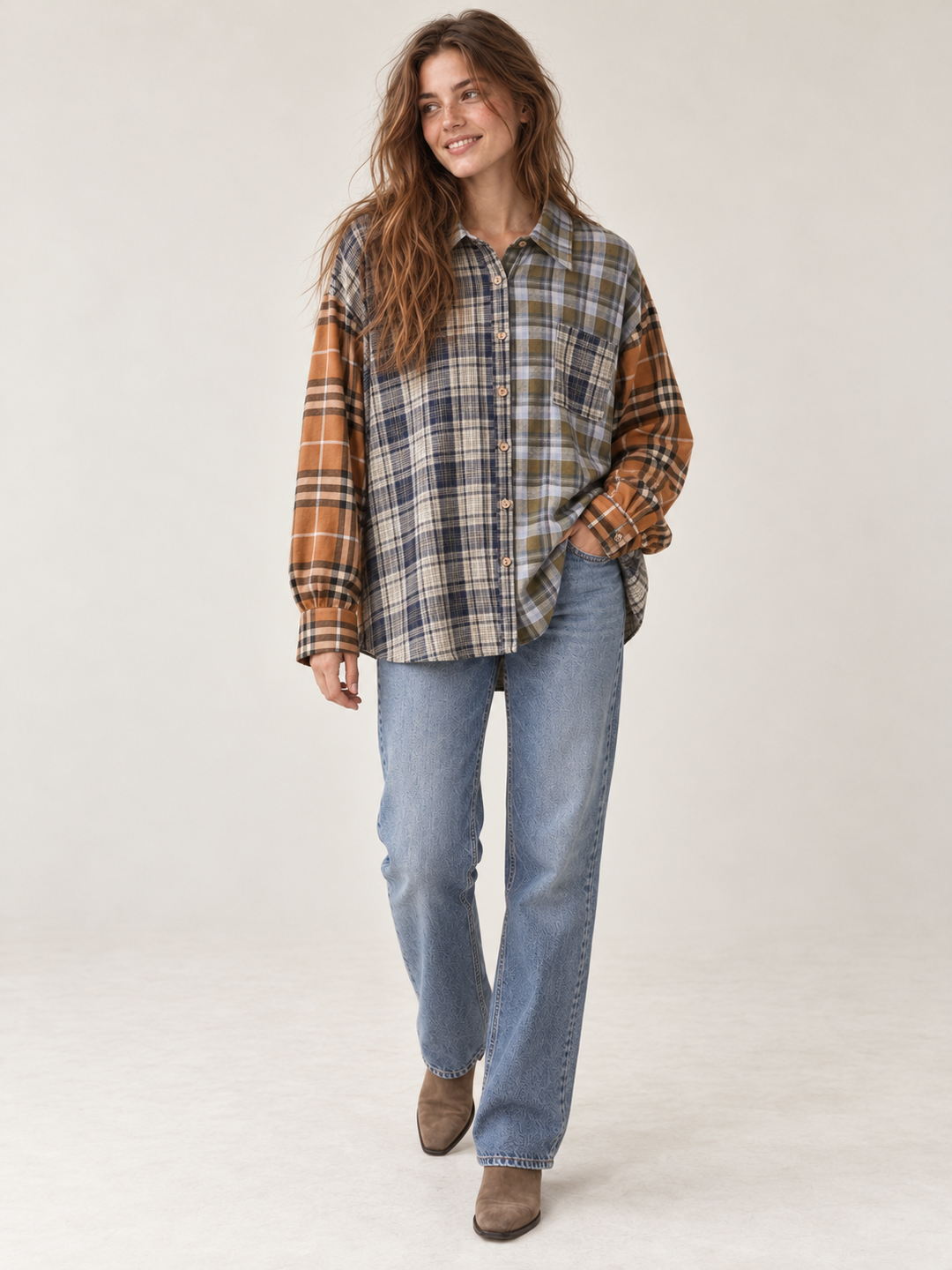 Oversized mixed plaid button-up shirt in navy, olive, cream and rust, full-body model view