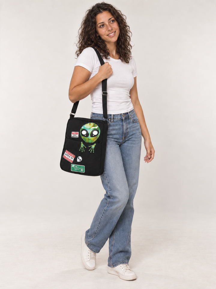 Model wearing the Peeking Alien Canvas Bag over her shoulder