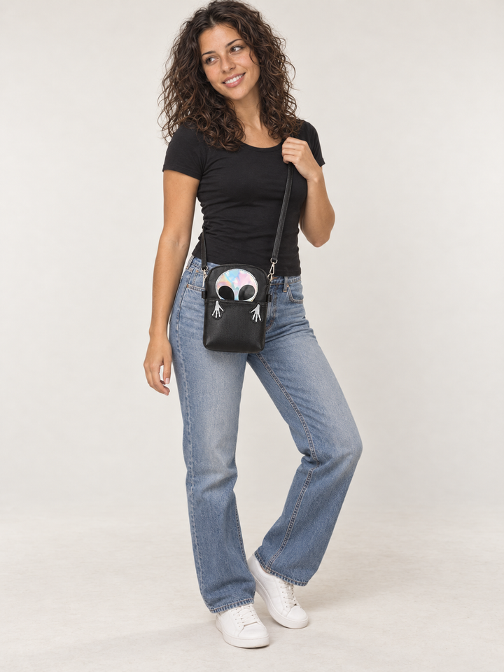 Model wearing the Peeking Alien Crossbody Bag