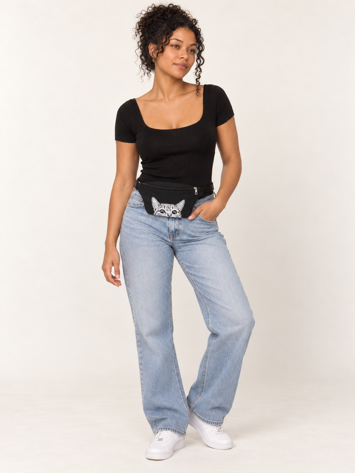 Model wearing the Peeking Cat Fanny Pack around her waist