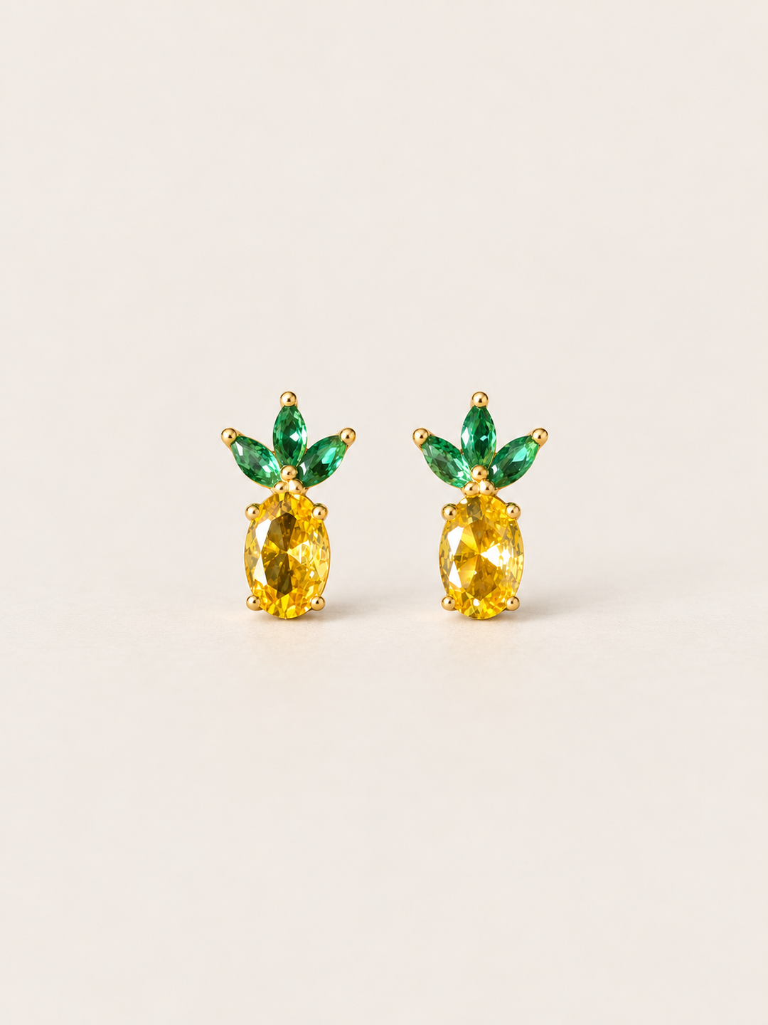 Pineapple Stud Earrings shown on a warm neutral background
