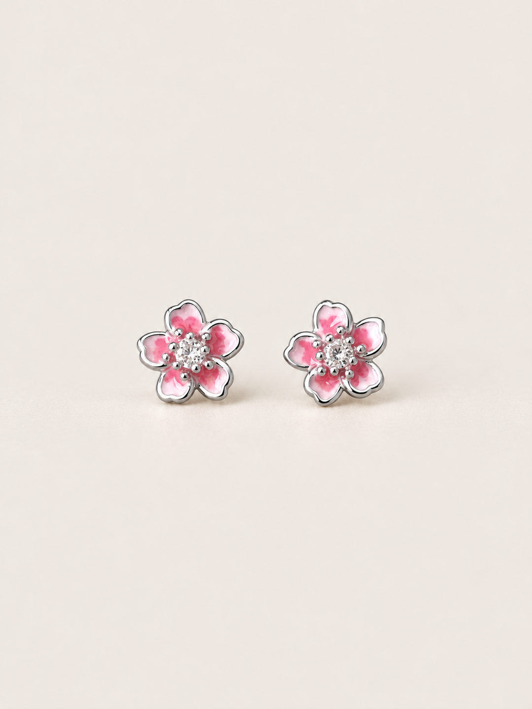 Pink Flower Stud Earrings shown on a warm neutral background