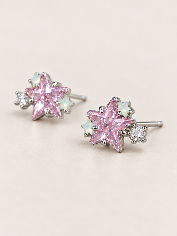 Pink Star Cluster Stud Earrings shown angled on a warm neutral background