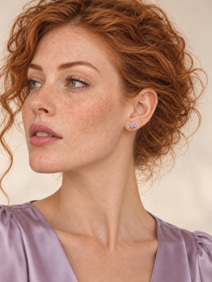 Pink Star Cluster Stud Earrings in silver worn on a model