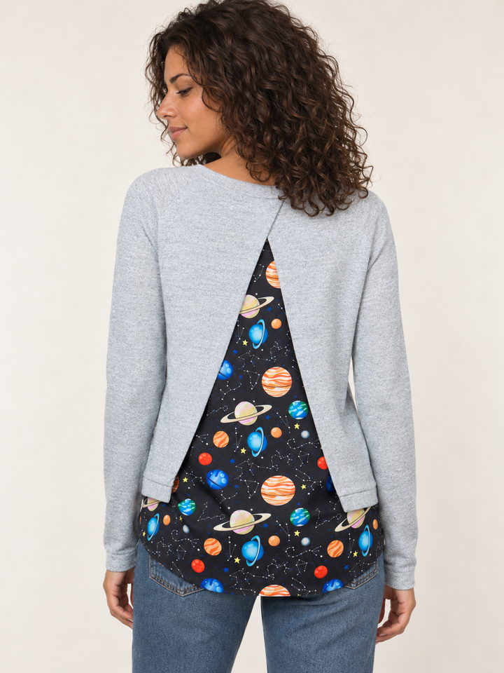 Model wearing Planets Open Back Sweater, back view