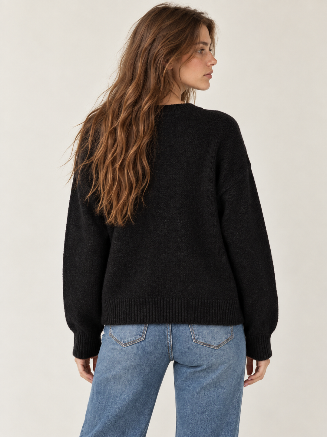 Model wearing Polar Bear Sweater Black, back view