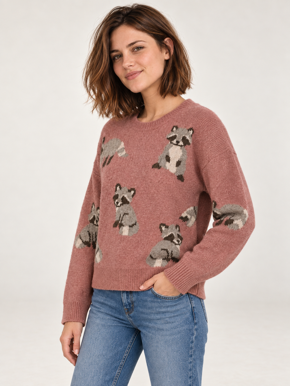 Model wearing Raccoon Sweater Mauve, angled view