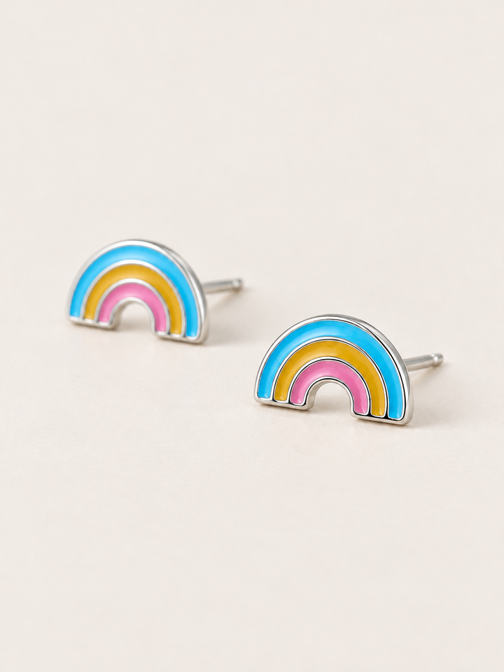 Enamel Rainbow Stud Earrings shown angled on a warm neutral background