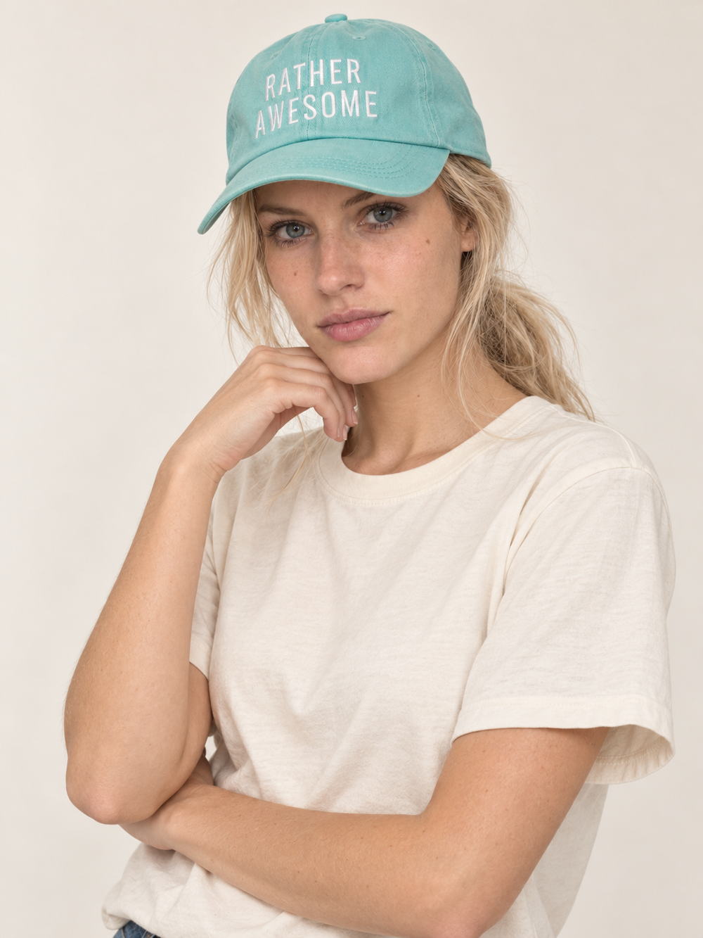 Model wearing Rather Awesome teal hat