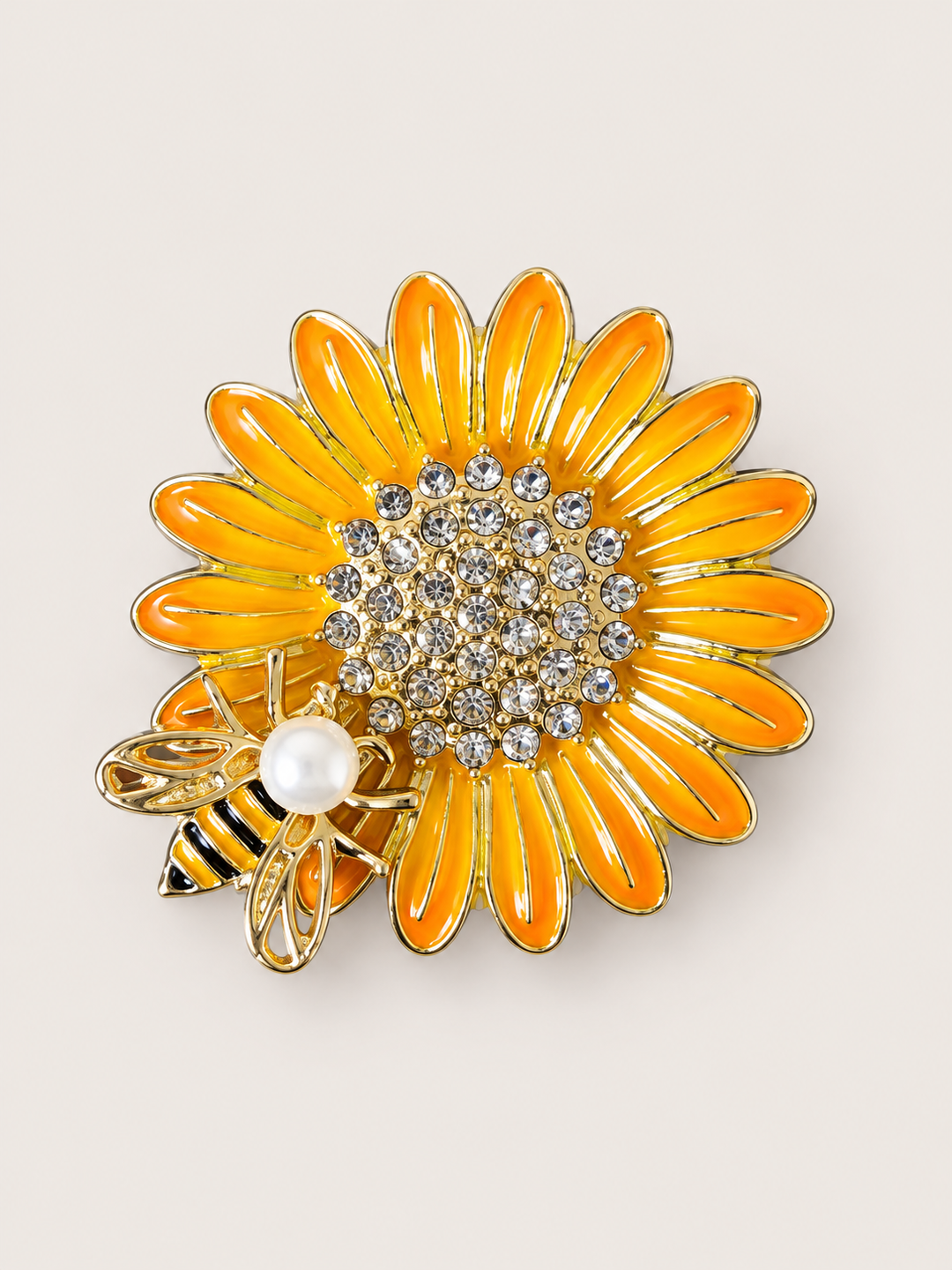 Rhinestone Sunflower Bee Pin shown on a warm neutral background
