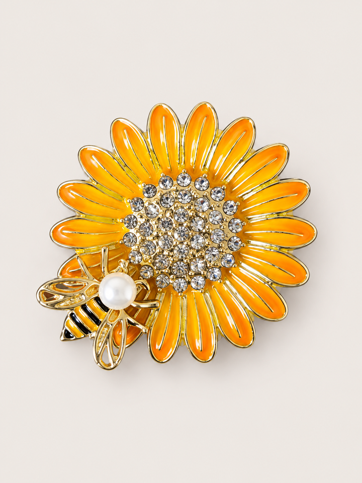 Rhinestone Sunflower Bee Pin shown on a warm neutral background