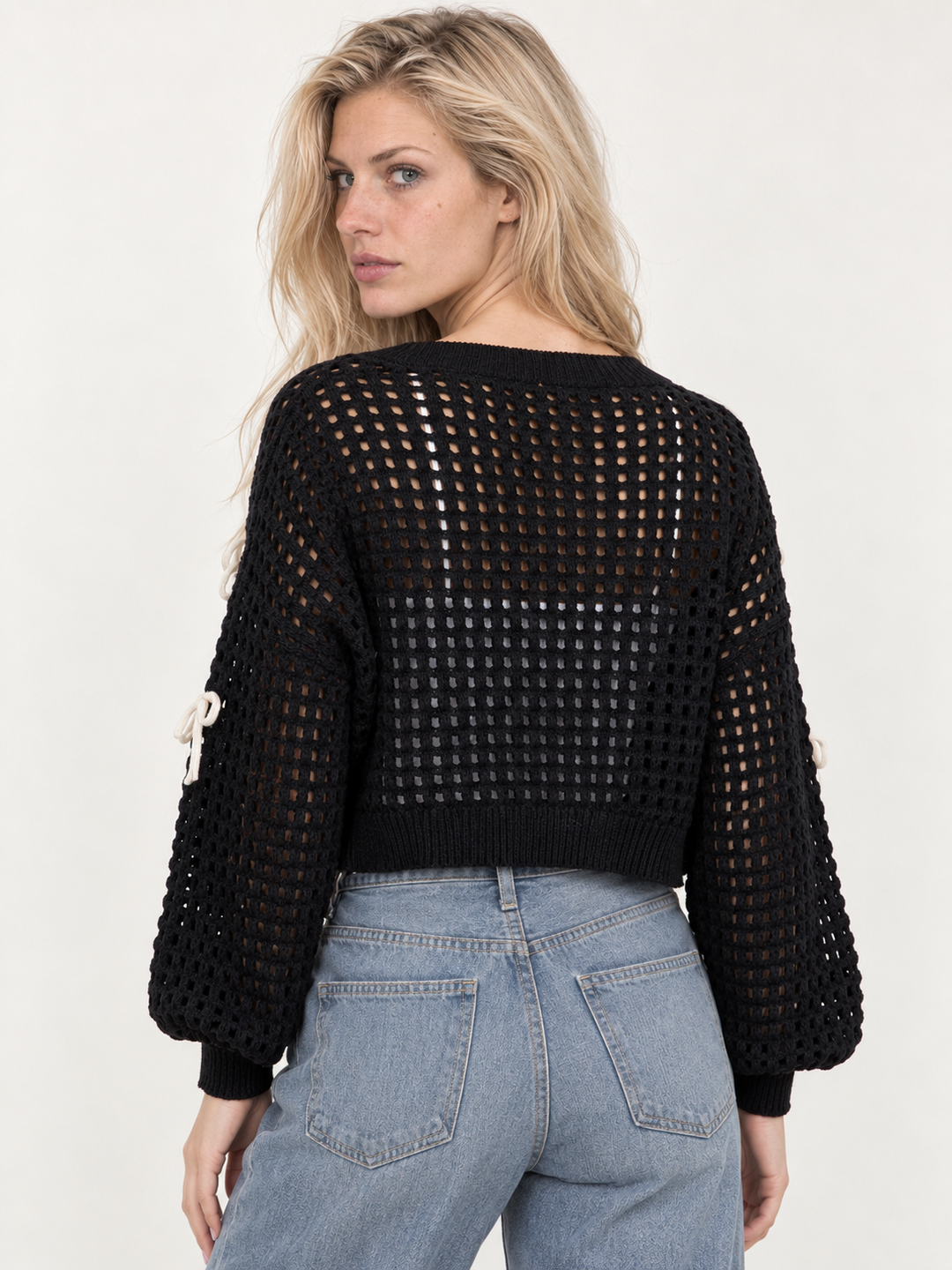 Model wearing the Ribbon Open Knit Cardigan Black — back view