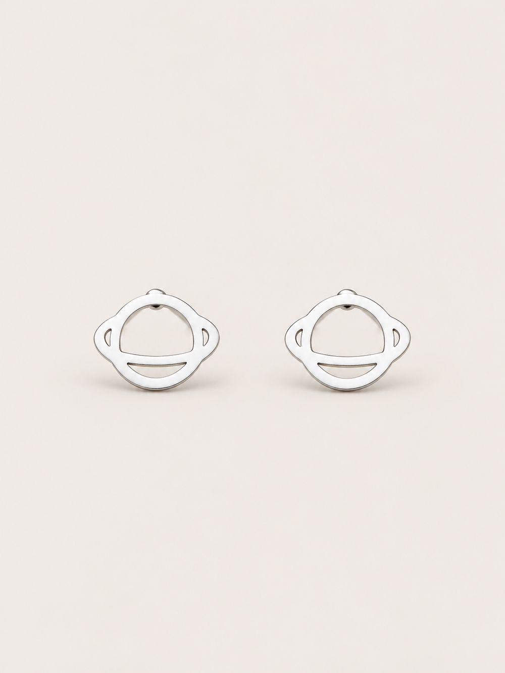 Ringed Planet Stud Earrings silver main view on a warm neutral background