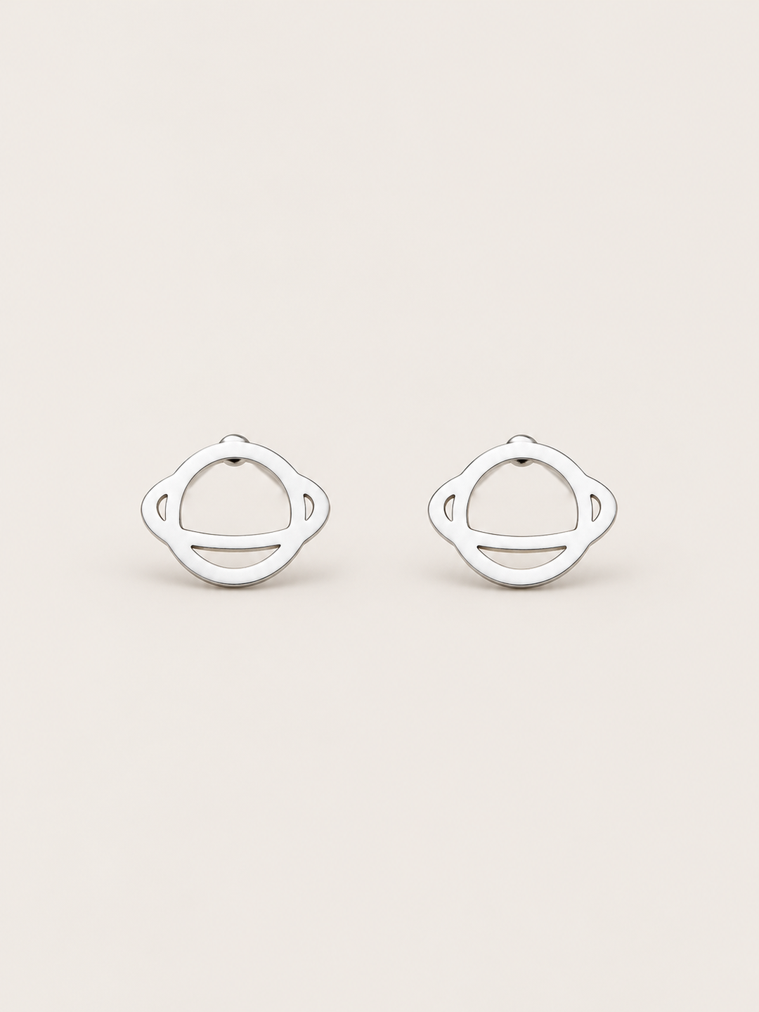 Ringed Planet Stud Earrings silver main view on a warm neutral background