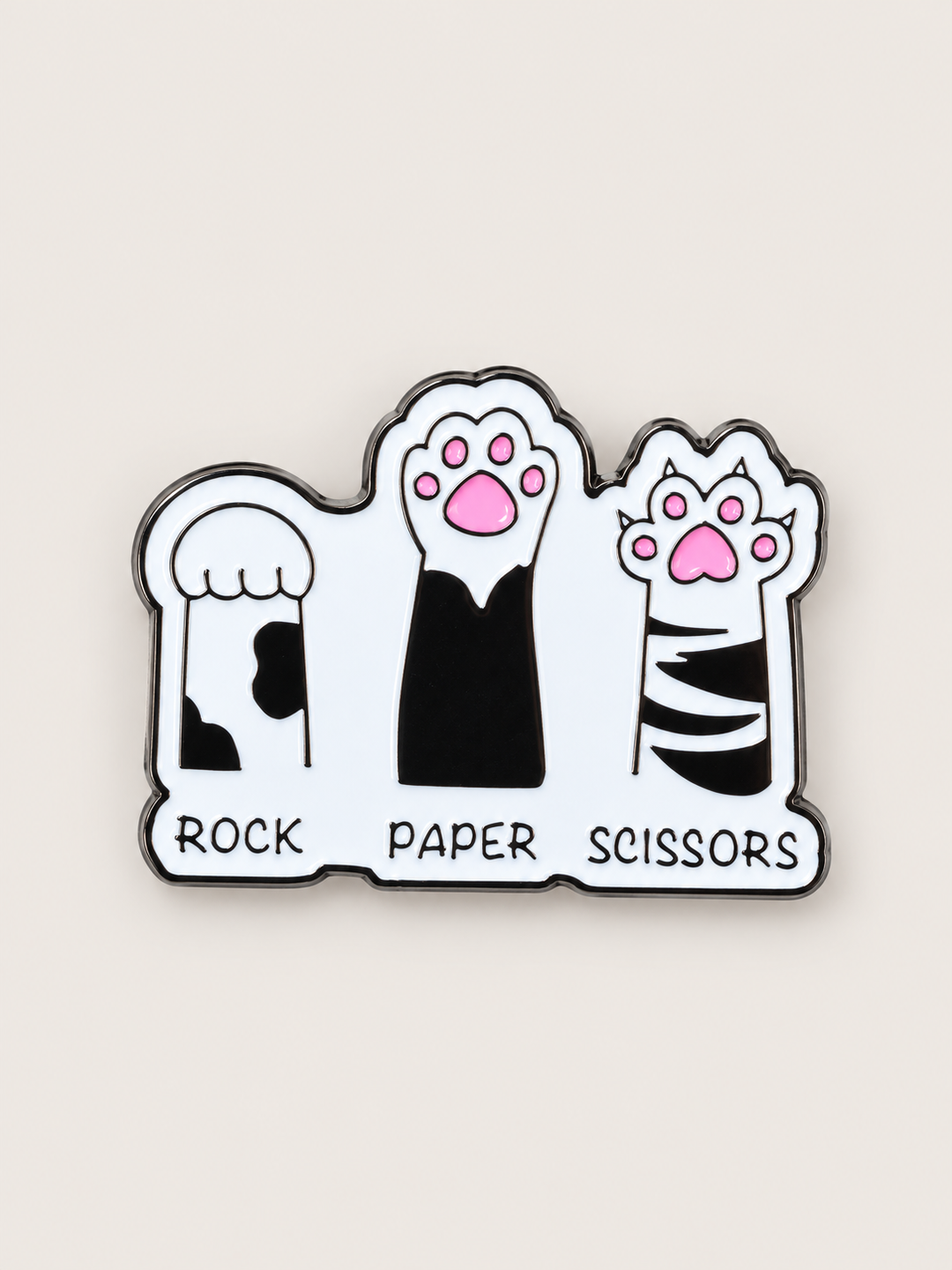 Rock Paper Scissors Cat Paws Pin shown on a warm neutral background