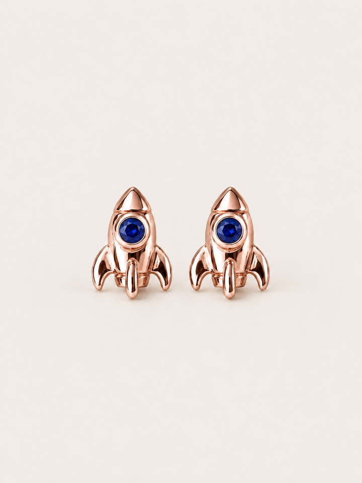 Rocket Stud Earrings in Rose Gold shown on a warm neutral background