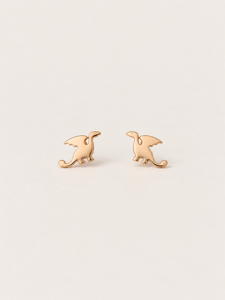 Dragon Stud Earrings shown on a warm neutral background