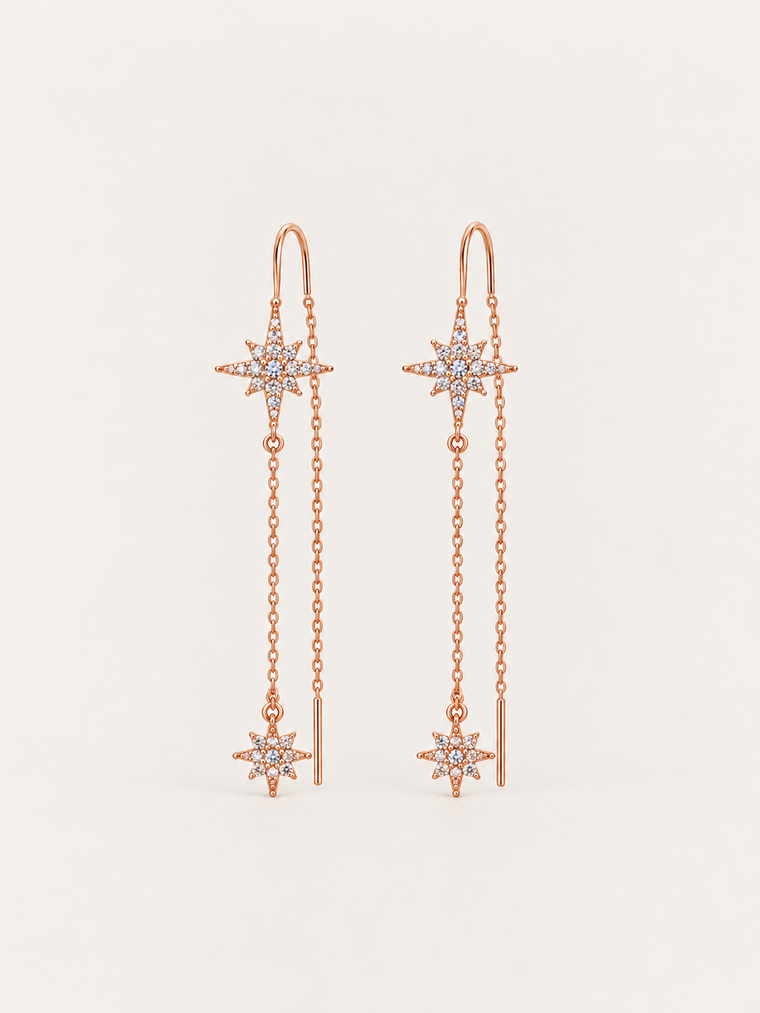 Crystal Starburst Threader Earrings shown on a warm neutral background