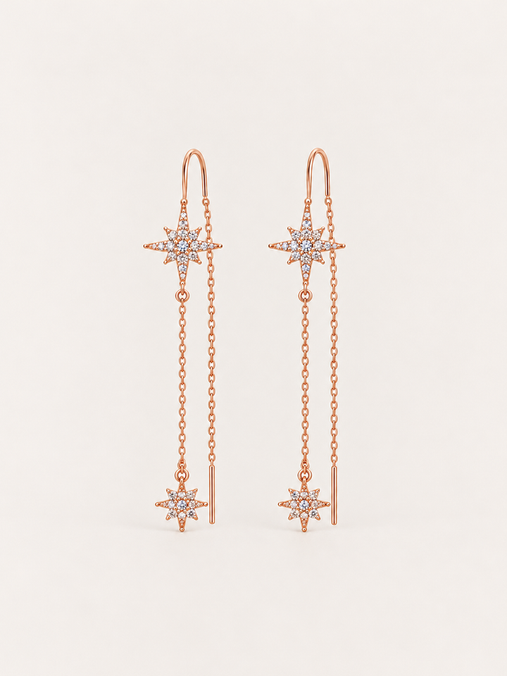 Crystal Starburst Threader Earrings shown on a warm neutral background