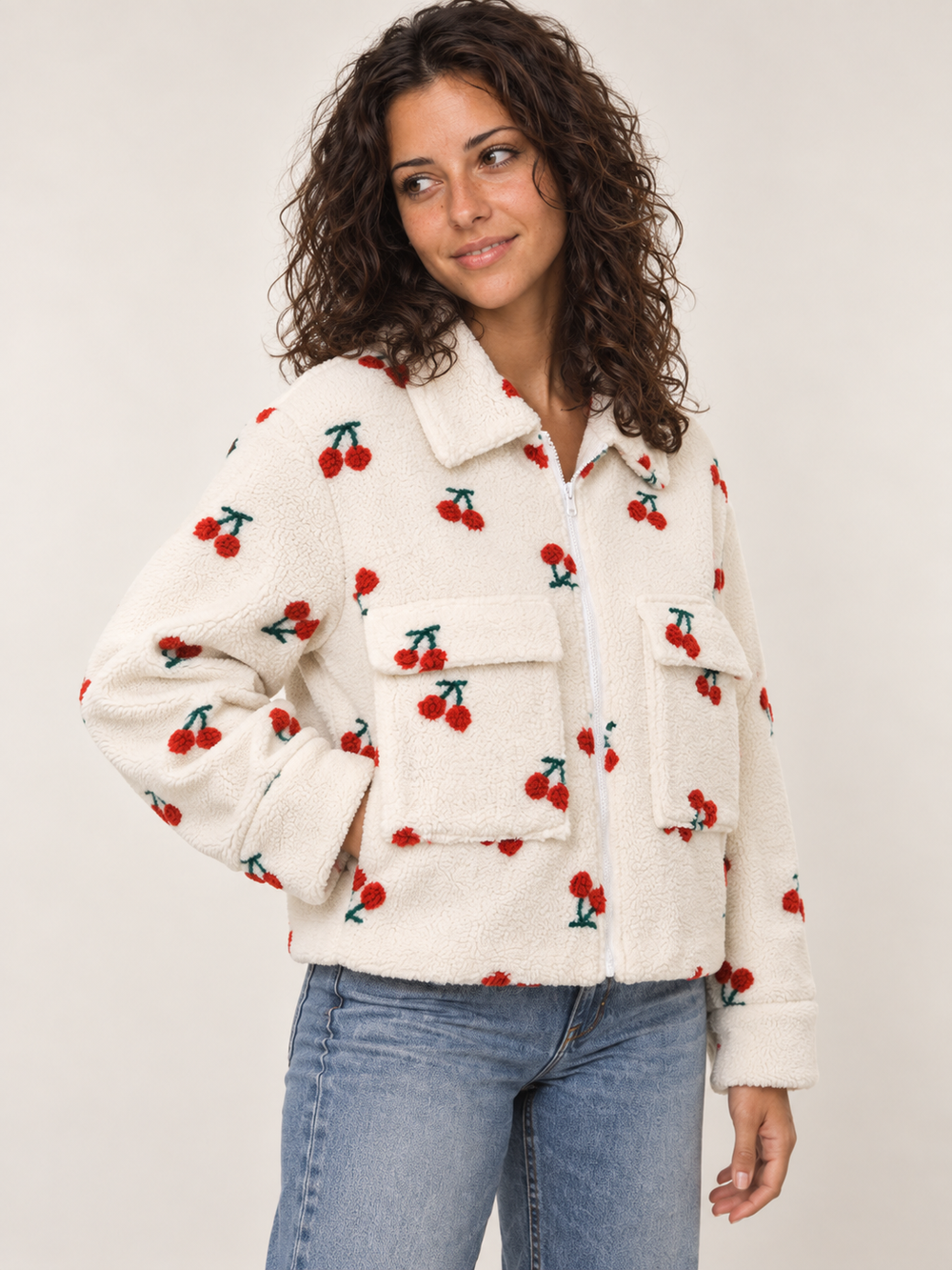 Model wearing Sherpa Cherry Jacket, three-quarter view