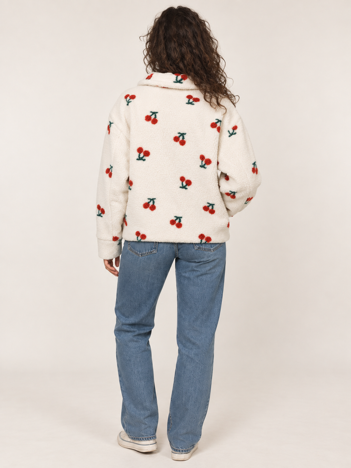 Model wearing Sherpa Cherry Jacket, back view