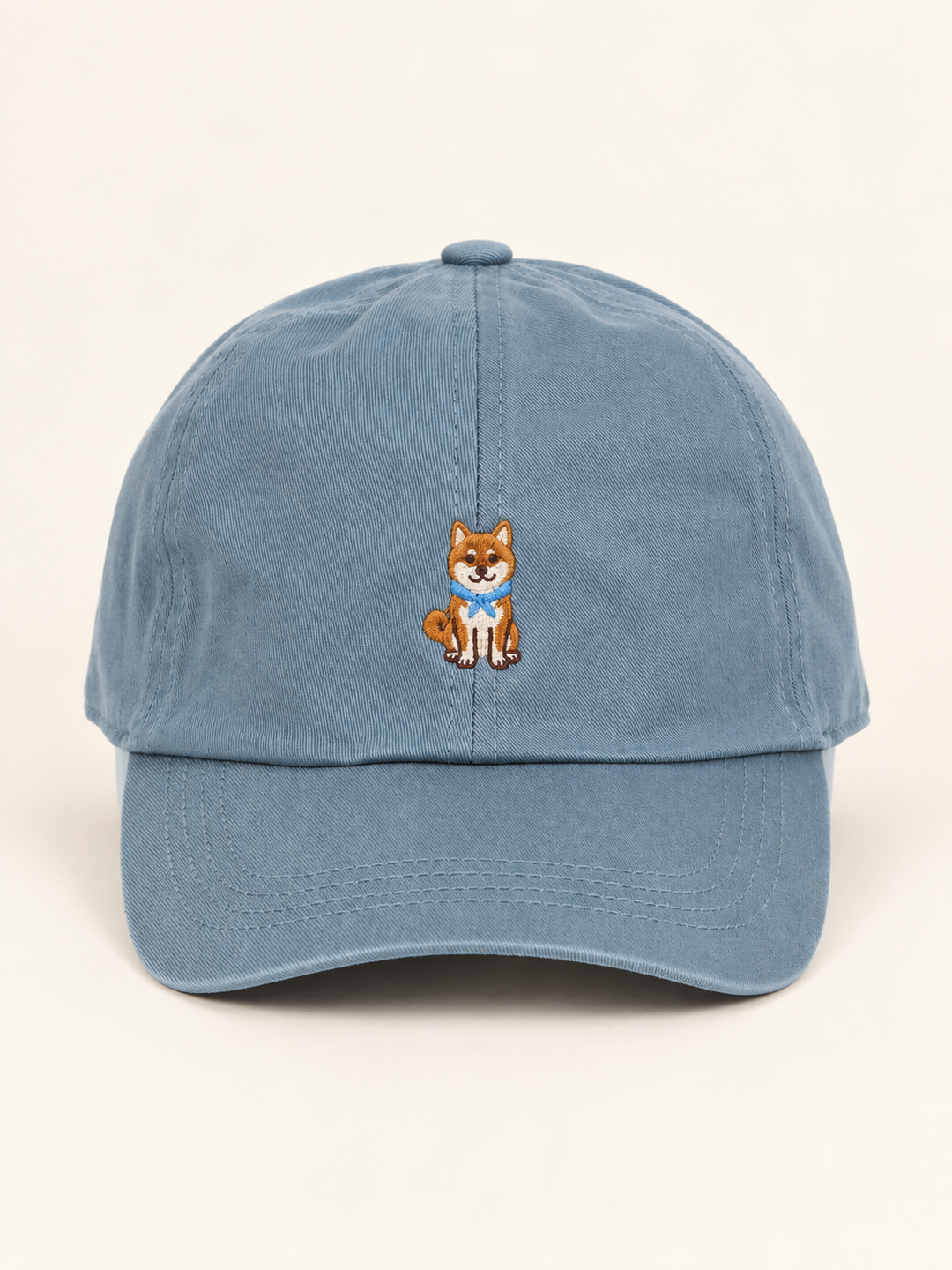 Front view of blue baseball cap with centered Shiba Inu embroidery