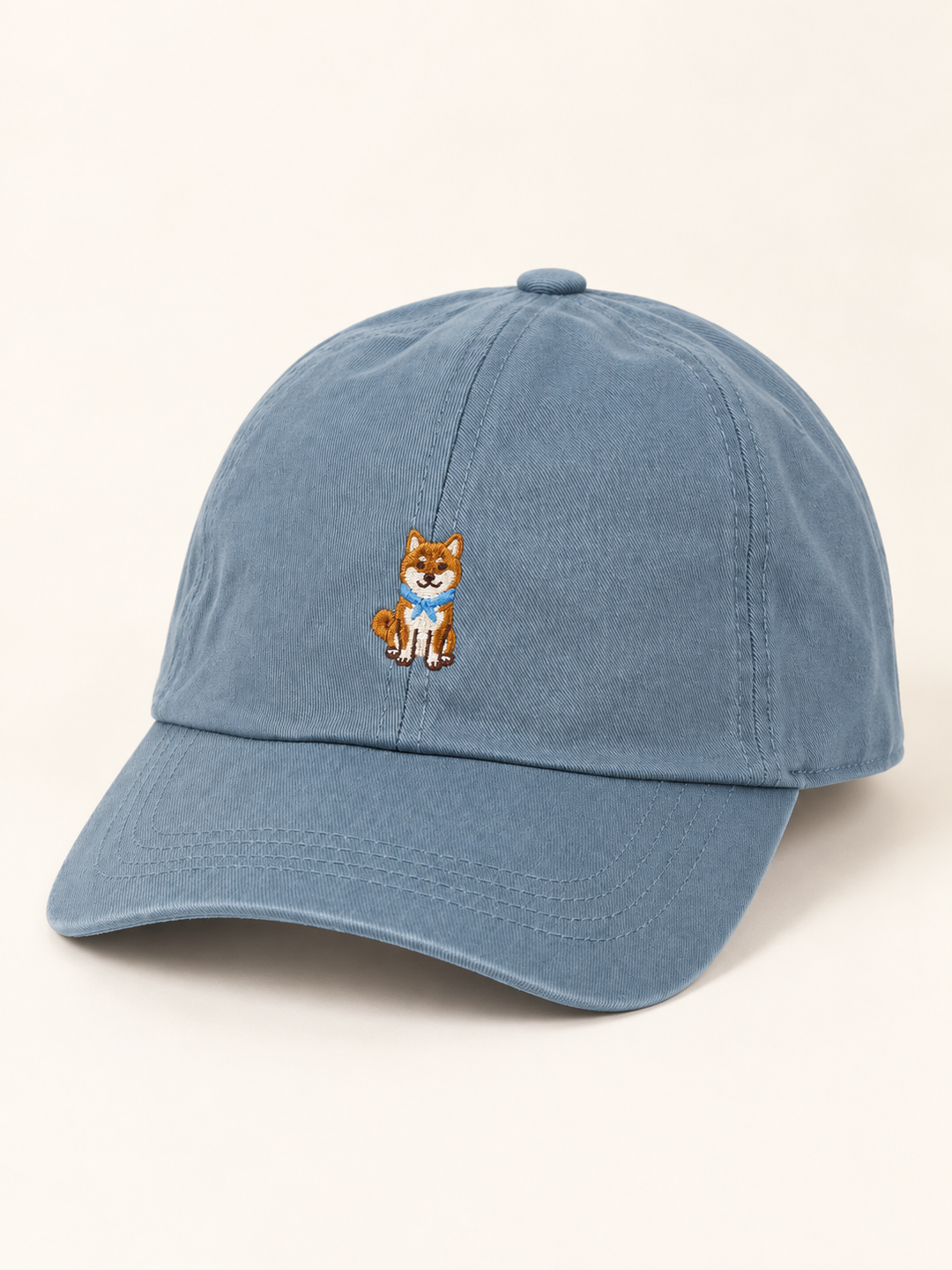 Three-quarter view of blue Shiba Inu embroidered baseball cap