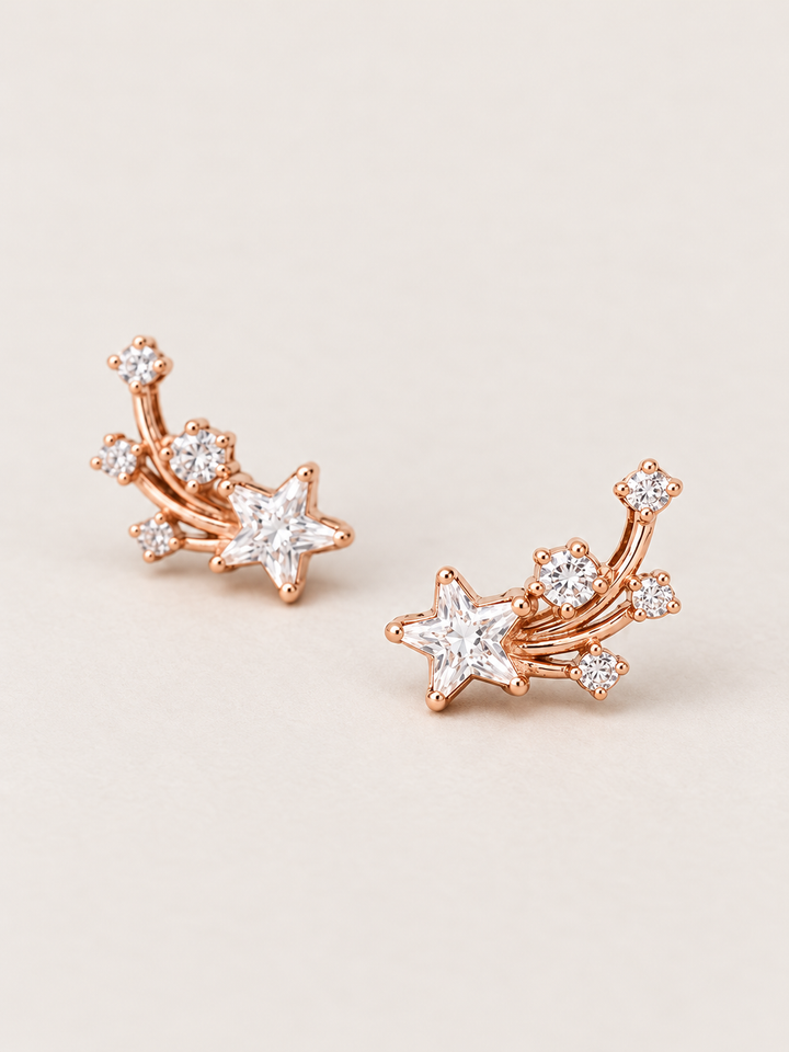 Shooting Star Earrings shown angled on a warm neutral background