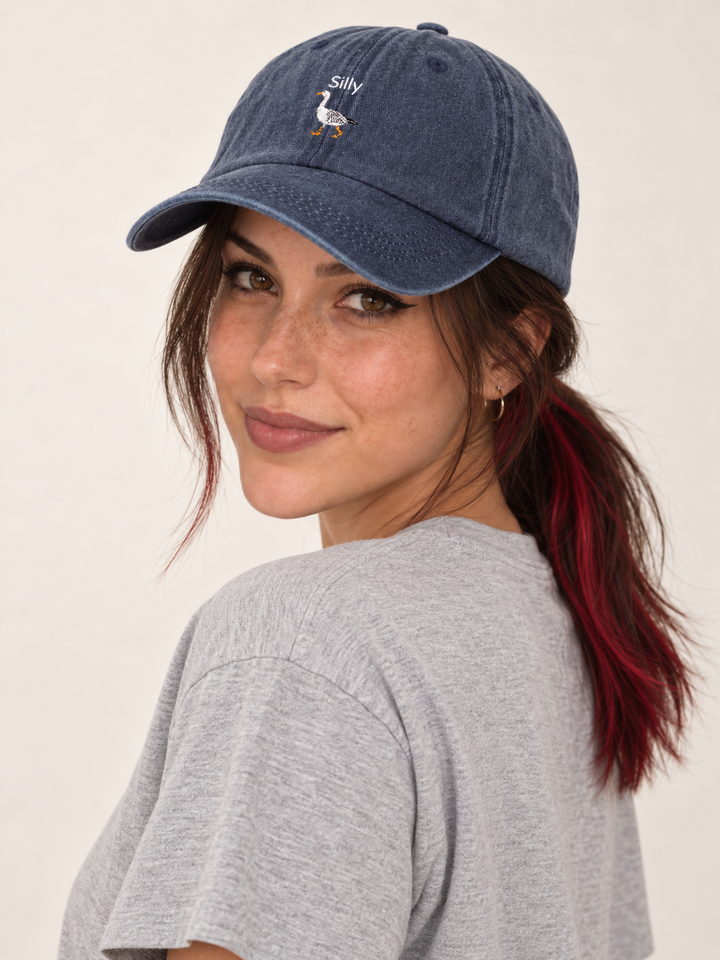 Model wearing Silly Goose navy hat