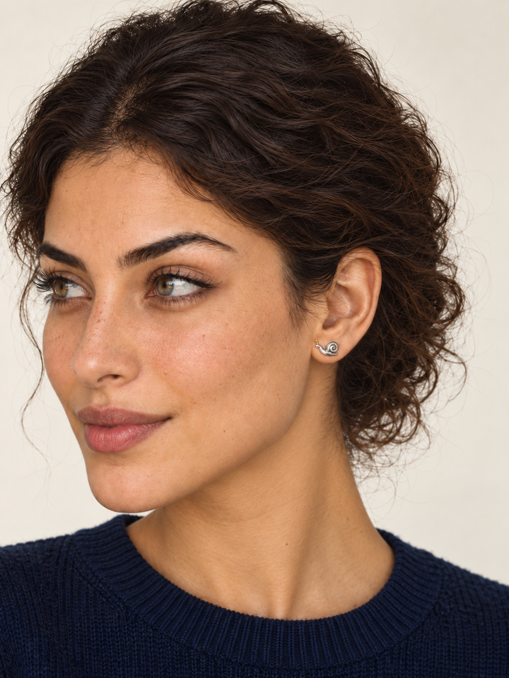 Snail Stud Earrings worn on a model