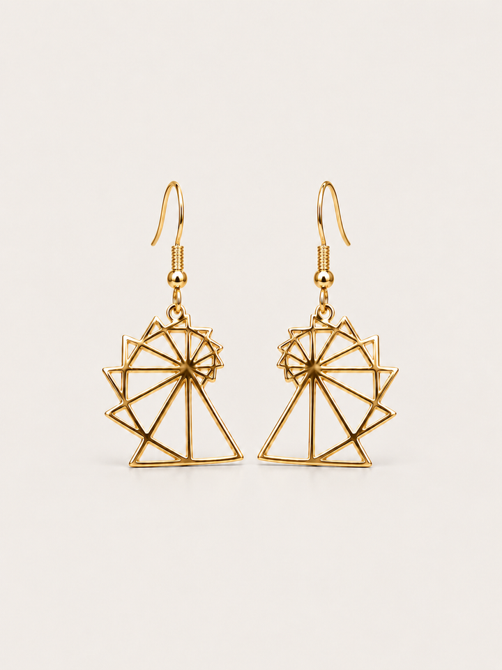 Spiral of Theodorus Earrings in Gold shown on a warm neutral background