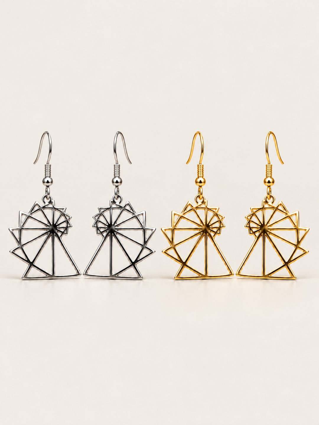 Spiral of Theodorus Earrings in Silver and Gold shown on a warm neutral background