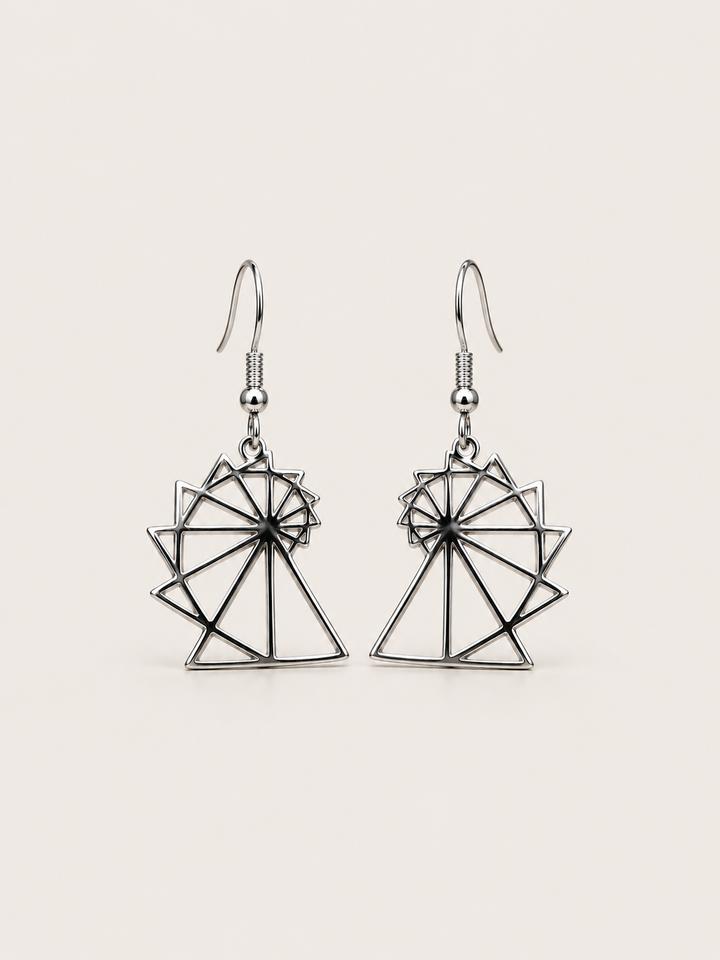Spiral of Theodorus Earrings in Silver shown on a warm neutral background