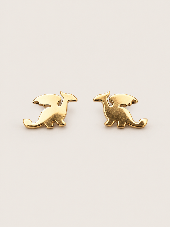 Gold main Stainless Steel Dragon Stud Earrings on a warm neutral background