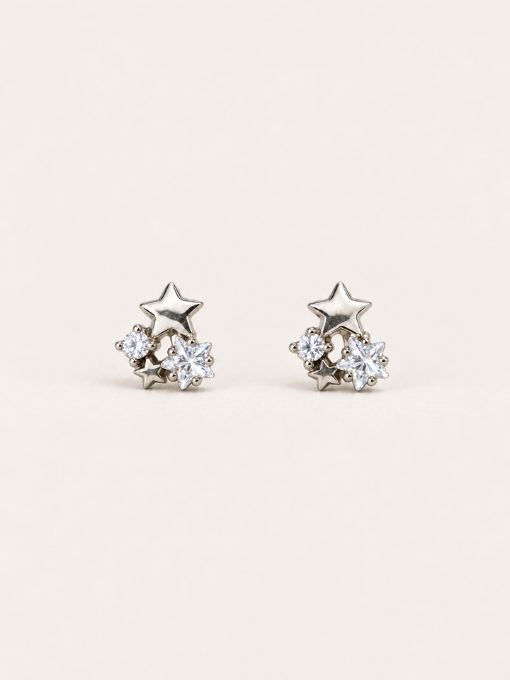 Star and Crystal Cluster Stud Earrings shown on a warm neutral background