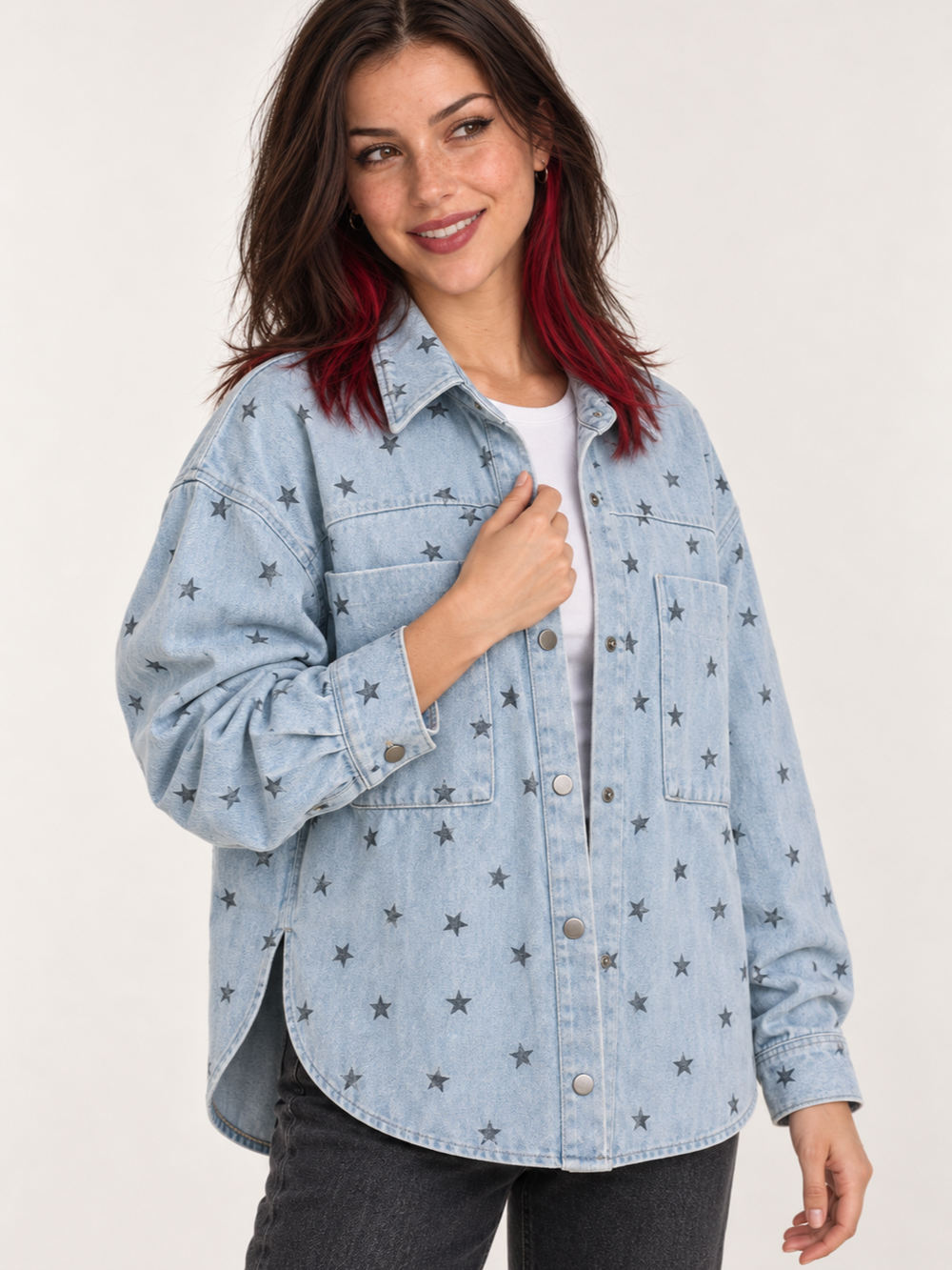 Model wearing Star Printed Denim Oversized Jacket, 45-degree view
