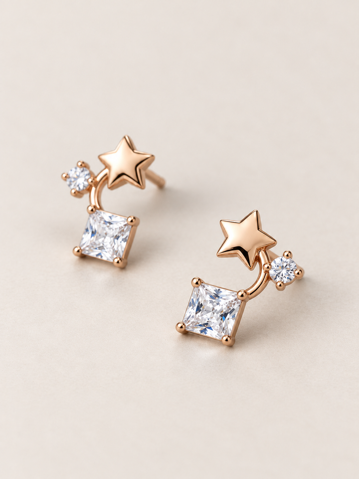 Star and Square Crystal Earrings shown angled on a warm neutral background