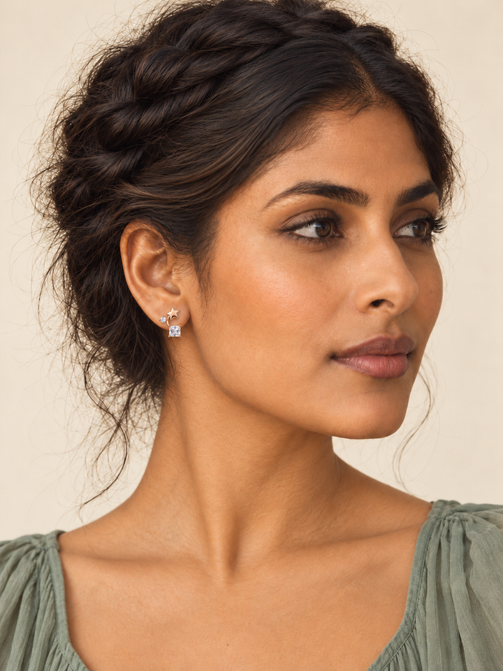 Model wearing rose gold Star and Square Crystal Earrings on the viewer-left ear