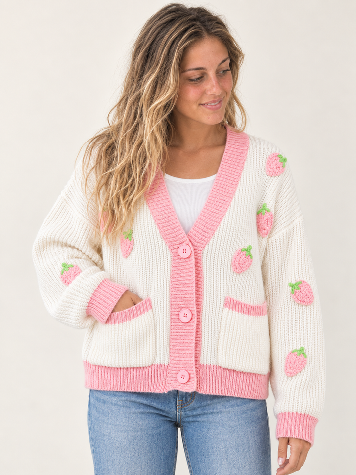 Model wearing Strawberry Button Up Cardigan Pink — front view