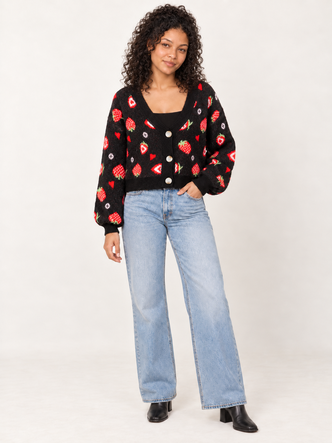 Model wearing Strawberry Heart Cardigan Black, full-body view