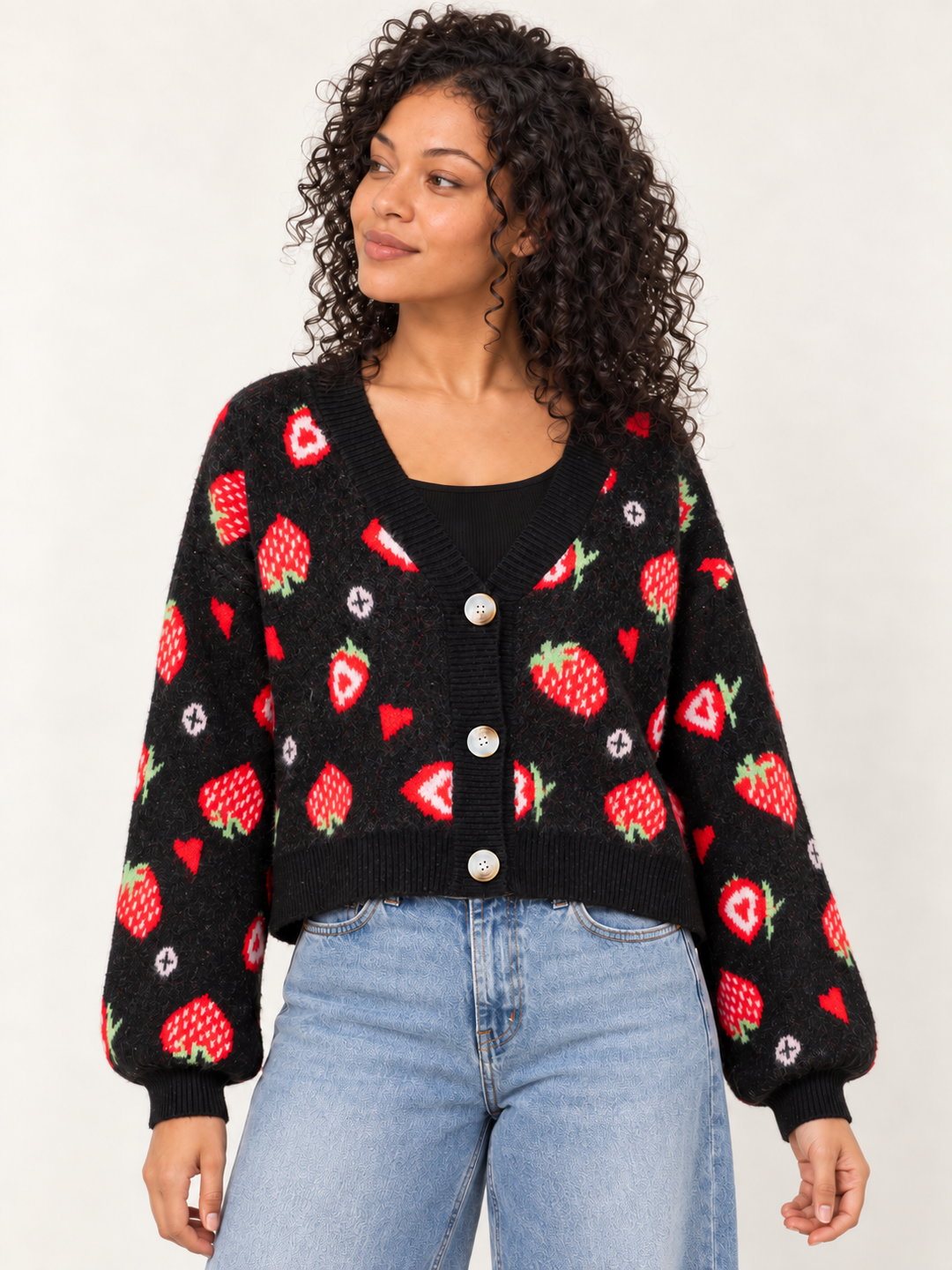 Model wearing Strawberry Heart Cardigan Black, front view