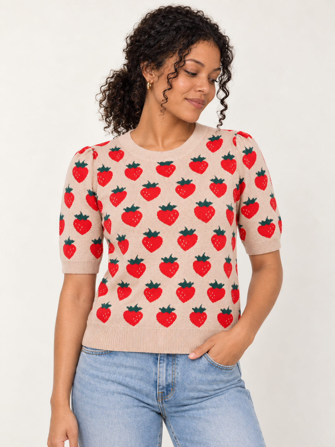 Model wearing strawberry knit short sleeve top in camel, front view