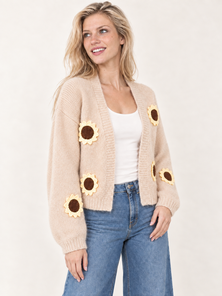 Model wearing Sunflower Bliss Knit Cardigan Tan, angled view