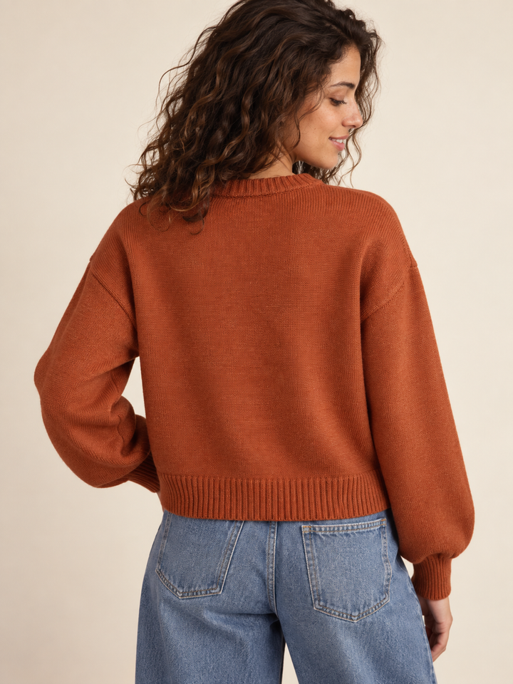 Swan Sweater Rust back view on model