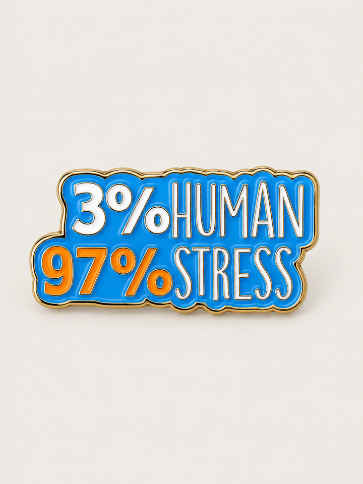 3 Percent Human 97 Percent Stress Pin shown on a warm neutral background