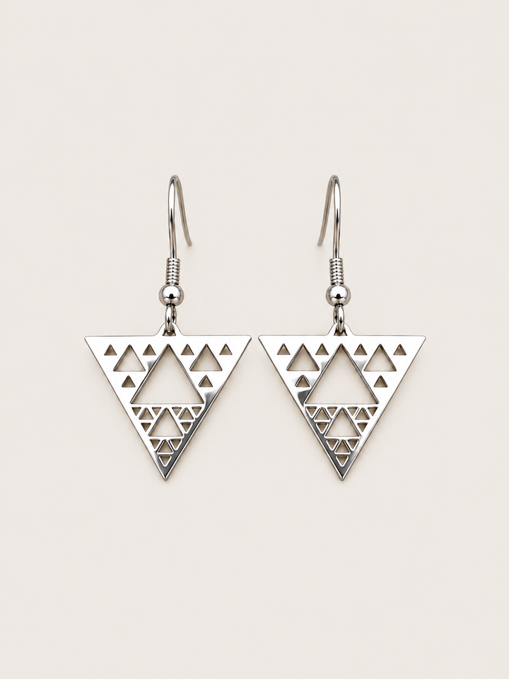 Silver Triangle Cutout Drop Earrings shown on a warm neutral background