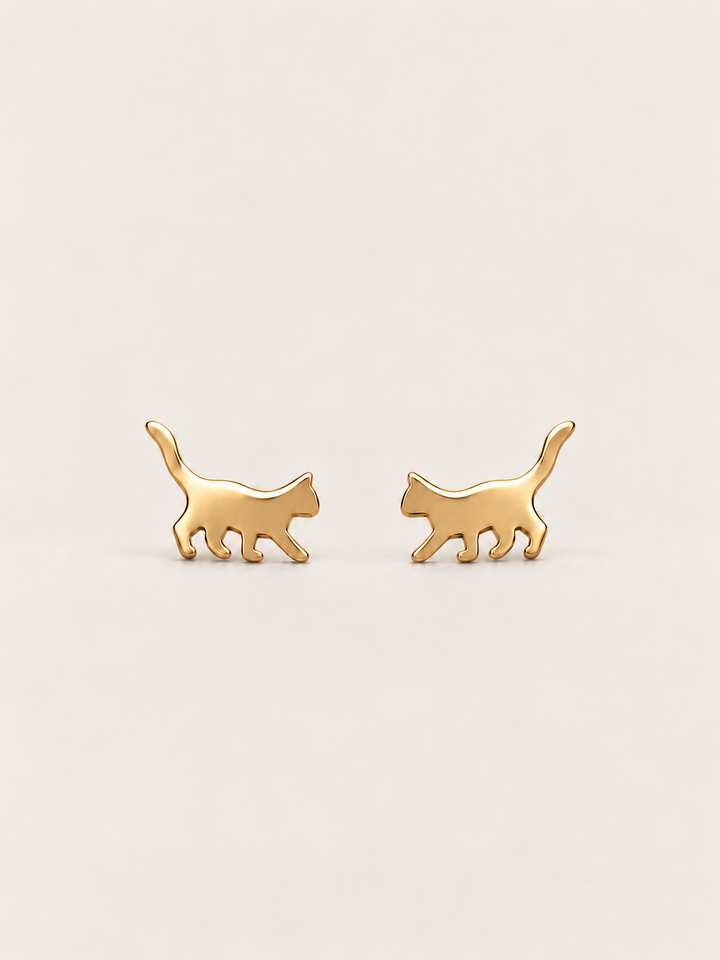 Gold Walking Cat Stud Earrings shown on a warm neutral background