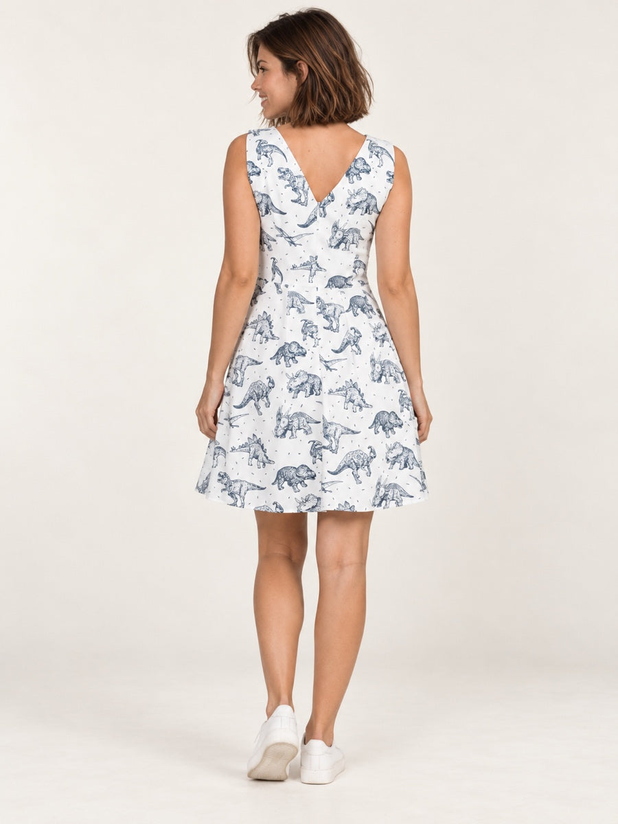 White dinosaur dress on model, full-body back view
